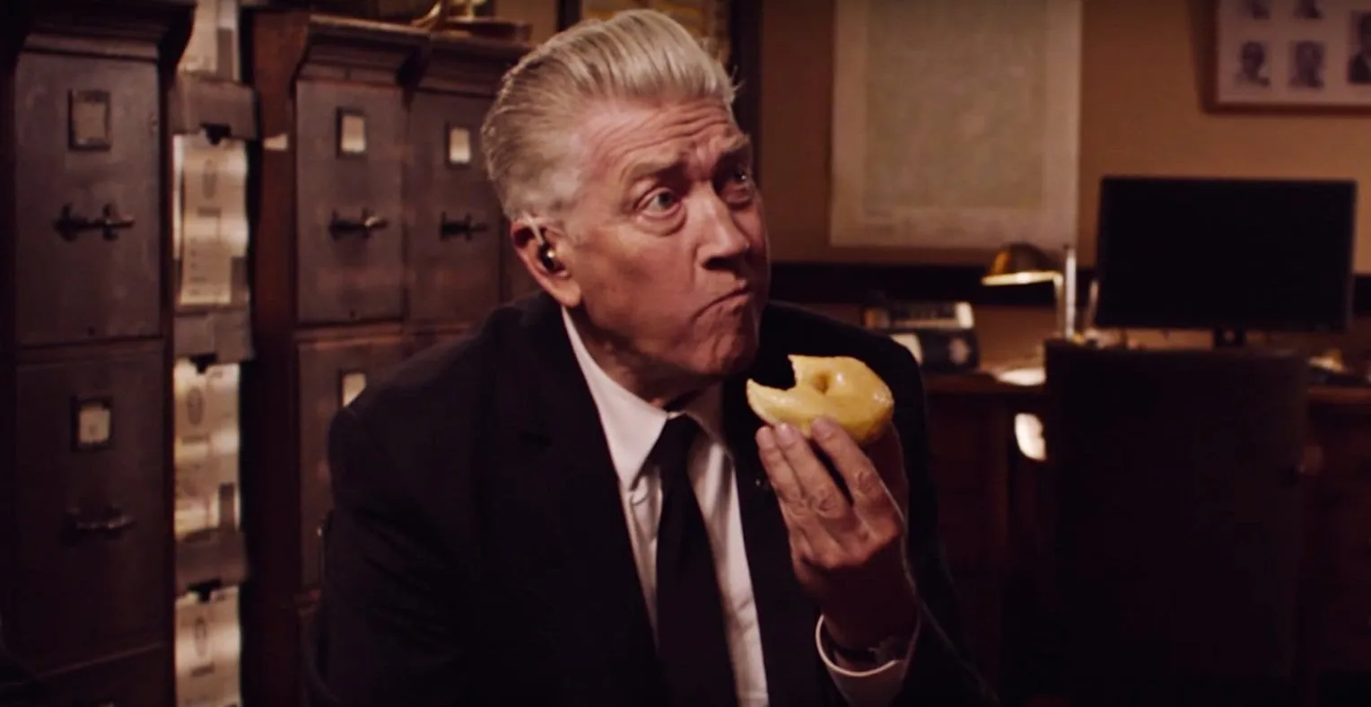 Gordon Cole David Lynch as Gordon Cole eats a donut