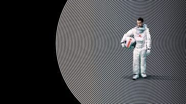 Moon poster image, Sam Rockwell holds his space helmet under his arm