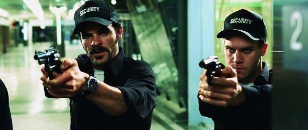 Mall cops with raised guns from Dawn of the Dead remake.