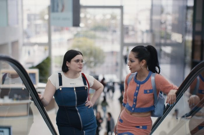 Kat and Maddy ride an escalator at the mall in HBO's Euphoria
