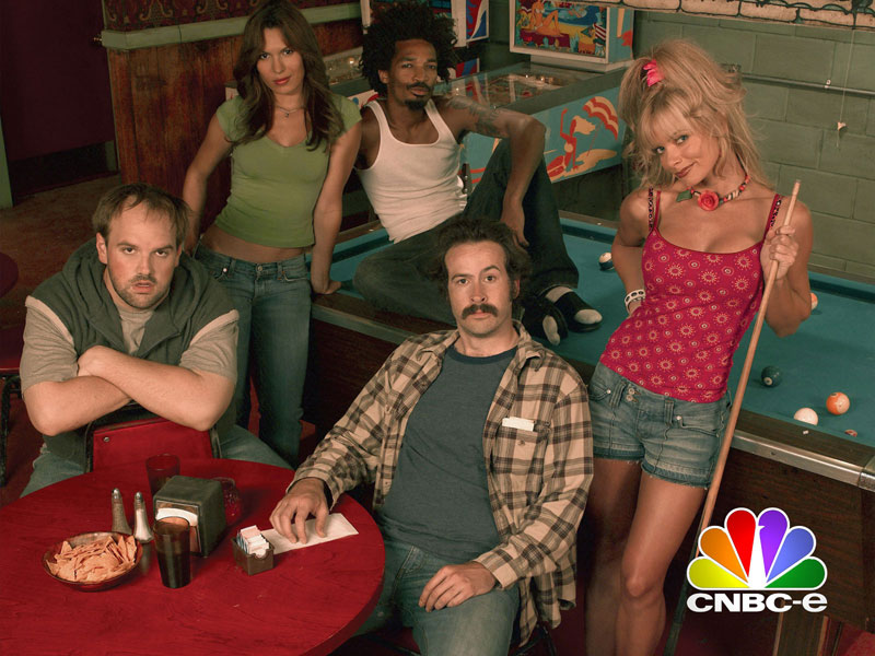 From left to right: Randy, Catalina, Crabman, Earl, and Joy pose at a bar next to a pool table