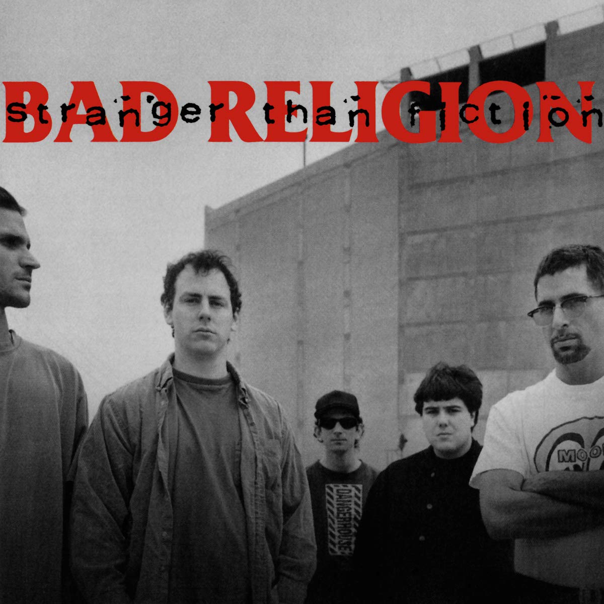 The cover to Bad Religion's Stranger Than Fiction has the band in a line in front of a building, in a black and white photo. 