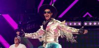 Andy Samberg performs in a flamboyant cowboy outfit as Conner4Real in Pop Star: Never Stop Never Stopping.