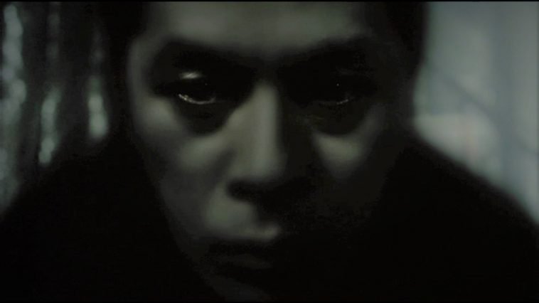 Closeup of a ghostly man in Pulse