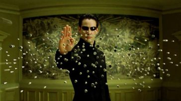 Neo stops a barrage of bullets in The Matrix Reloaded