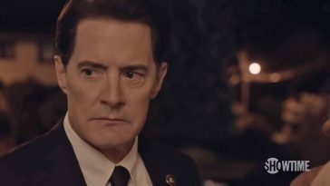 A close-up on Dale Cooper, ready to ask "what year is this," after his plan did not work as expected.