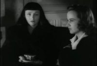 Mary (Kim Hunter) and Jacqueline (Jean Brooks) sitting and thinking, partly in shadow