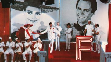 Farley Flavors take Janet Major's hand on an episode of Faith Factory in Shock Treatment