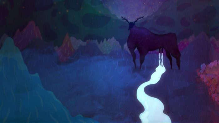 A yak leaks milk from its utters in a colorful mountain forest setting