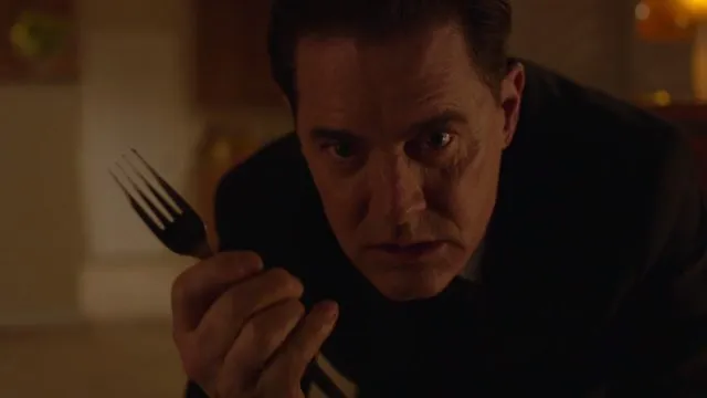 Dougie Jones seems to be Dale Cooper again, crawling across the floor slowly with Fork in hand.