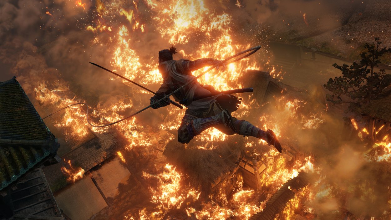 Sekiro leaps through the air above a burning city