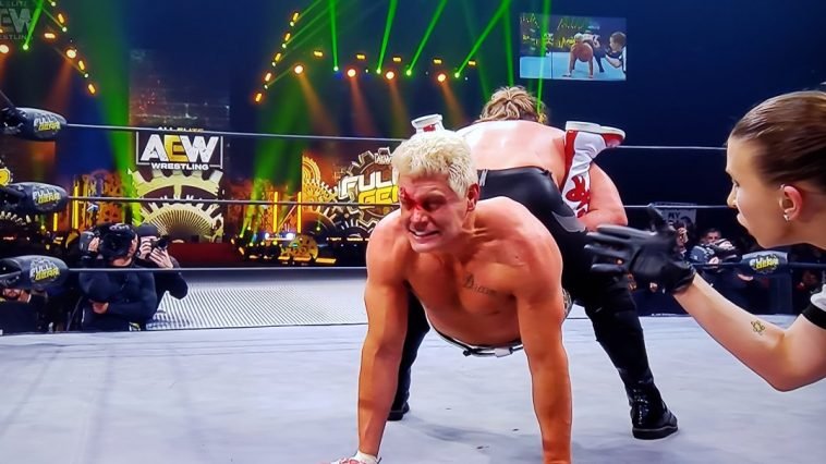 Cody Rhodes bleeding and in pain as Chris Jericho tries to put him in the "Walls of Jericho" at AEW Full Gear 2019