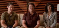 Kelvin (Adam Devine), Jesse (Danny McBride) and Judy (Edi Patterson) sit on a couch in their father's office.