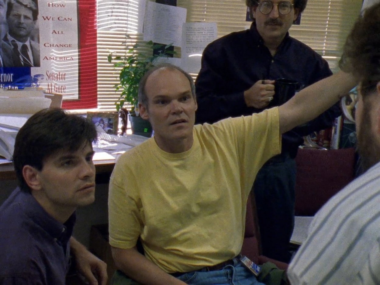 James Carville and George Stephanopoulos discuss strategy in a campaign office