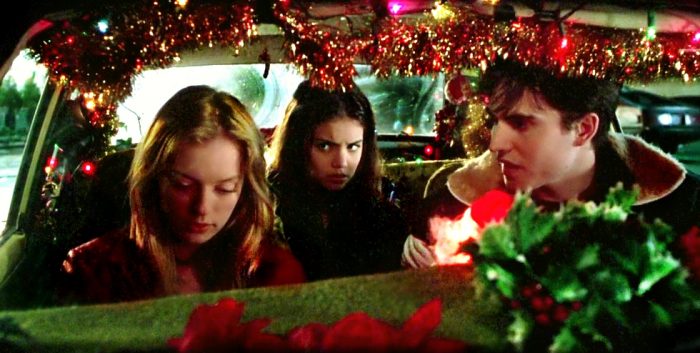 Ronna, Claire and Manny sit in a car outside Todd's house planning a drug buy
