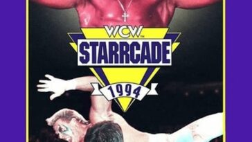 The poster shows two wrestlers in the ring on the bottom half, but the top half is dominated by the fexing torso and head of new arrival to WCW Hulk Hogan.
