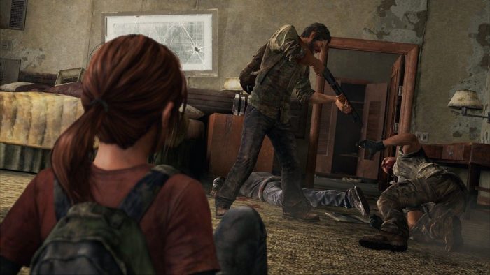 Ellie watches while Joel prepares to execute an enemy with the shotgun.