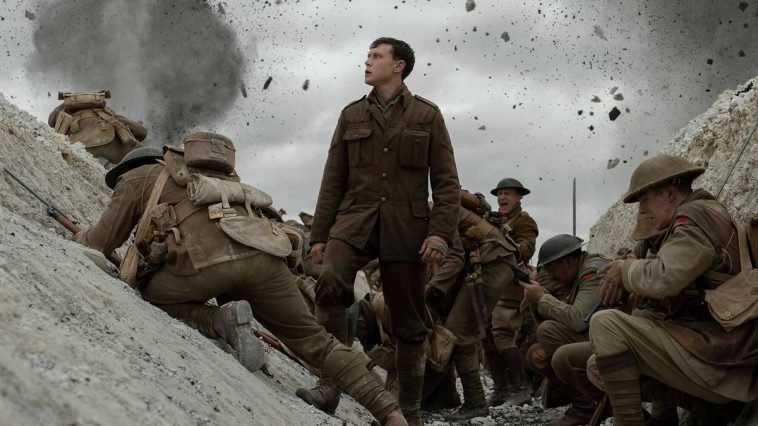 Lance Corporal Schofield peers closer to the top of the trench during battle