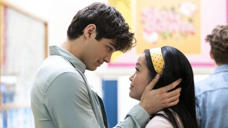A man holds a woman's head in his hands in P.S. I Still Love You