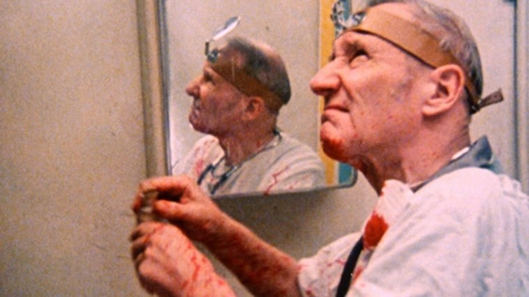 William S. Burroughs acts out a scene from Naked Lunch in Burroughs: The Movie