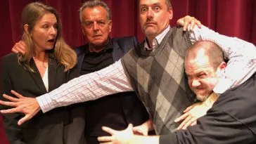 Scott Ryan helps fight off a fan away from Sheryl Lee (Laura Palmer) and Ray Wise (Leland Palmer)