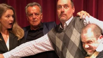 Scott Ryan helps fight off a fan away from Sheryl Lee (Laura Palmer) and Ray Wise (Leland Palmer)