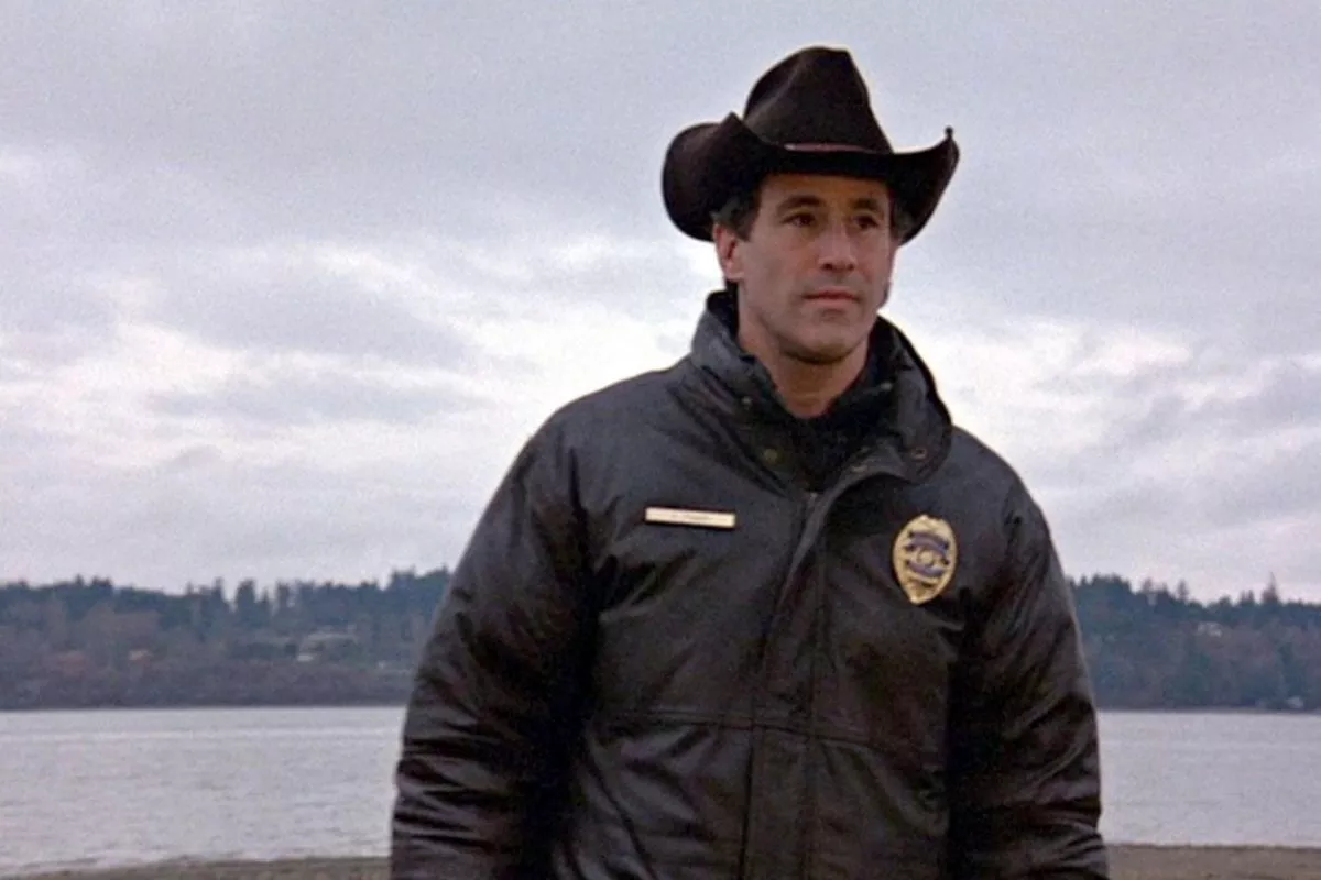 Sherrif Truman wearing a coat and hat