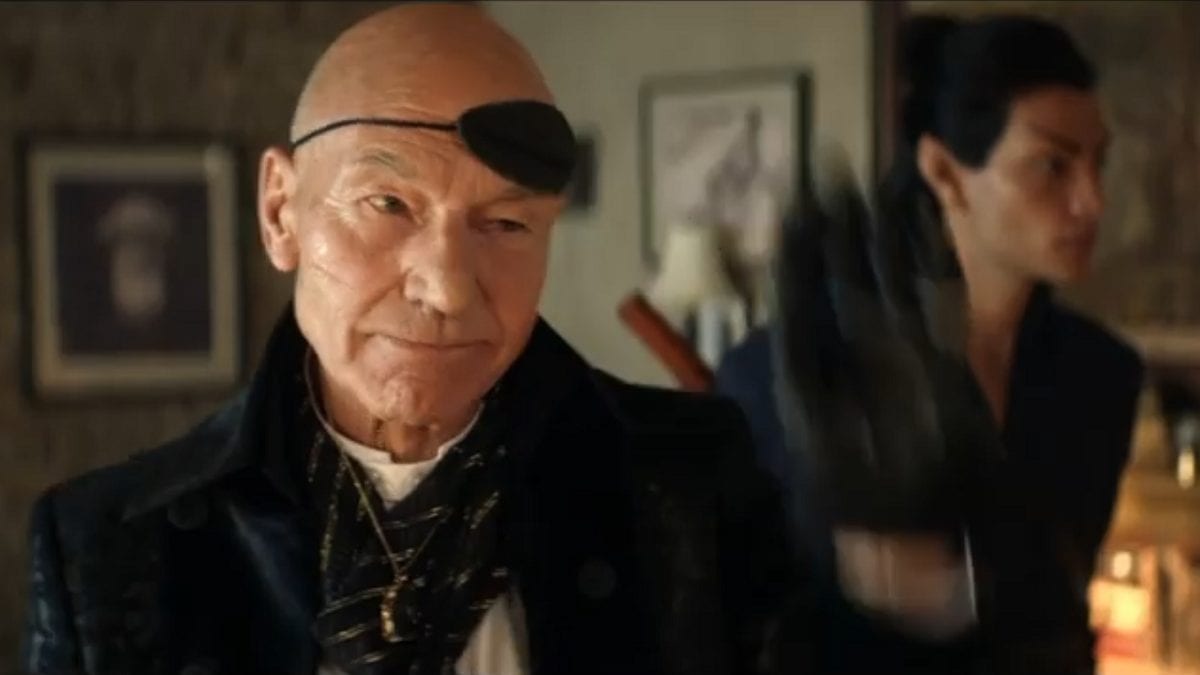 Picard S1E5 Picard in costume as a smuggler with his eye patch flipped up