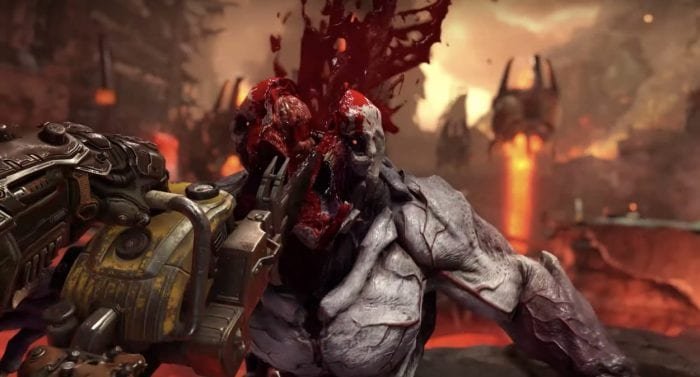 The Doom Slayer cuts a demon down the middle with a chainsaw. This is awesome.
