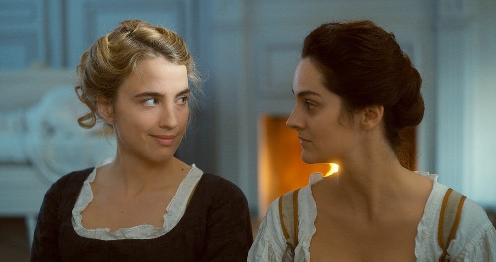 Heloise (left) and Marianne (right) look at each other