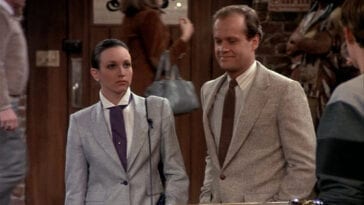 Frasier and Lilith stand at the bar, Lilith glares at the bartender