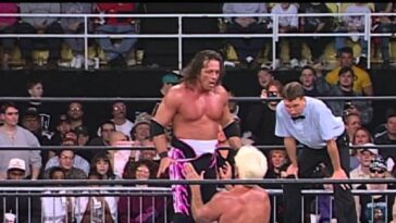 Bret Hart bears down on a cowering Ric Flair at WCW Souled Out 1998