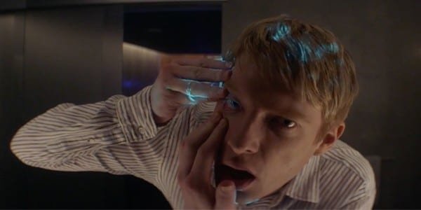 Caleb is pulling his eye open, to examine it for any signs of anything artificial.