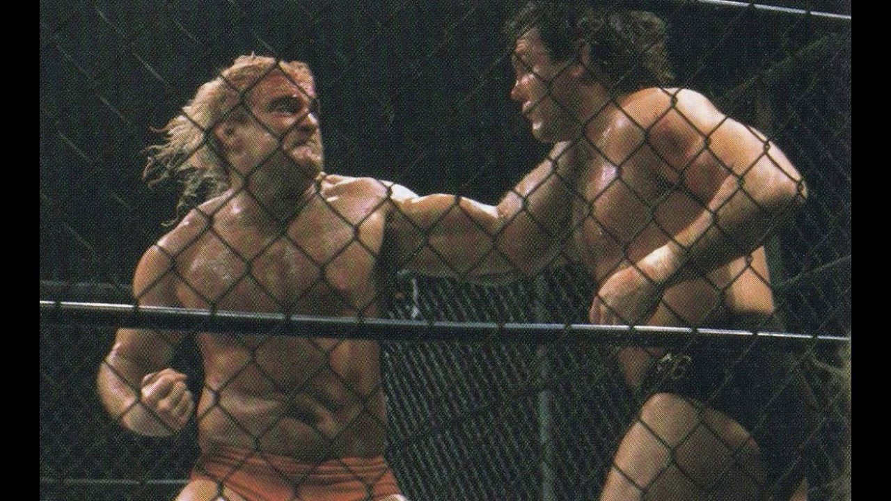 Magnum T.A. takes a swing at Tully Blanchard in their steel cage I Quit match at Starrcade '85