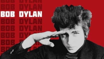 a young Bob Dylan salutes in front of a red backdrop