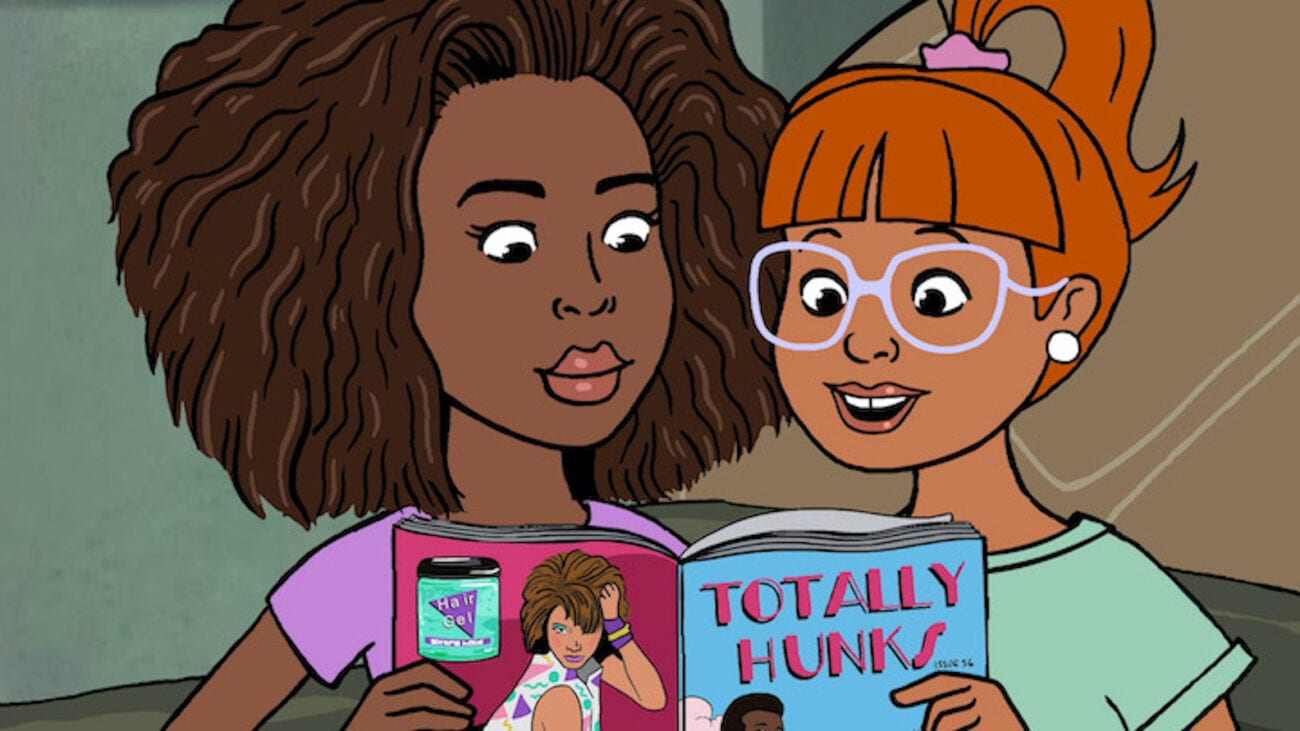 Finley and Grey look at a Totally Hunks magazine