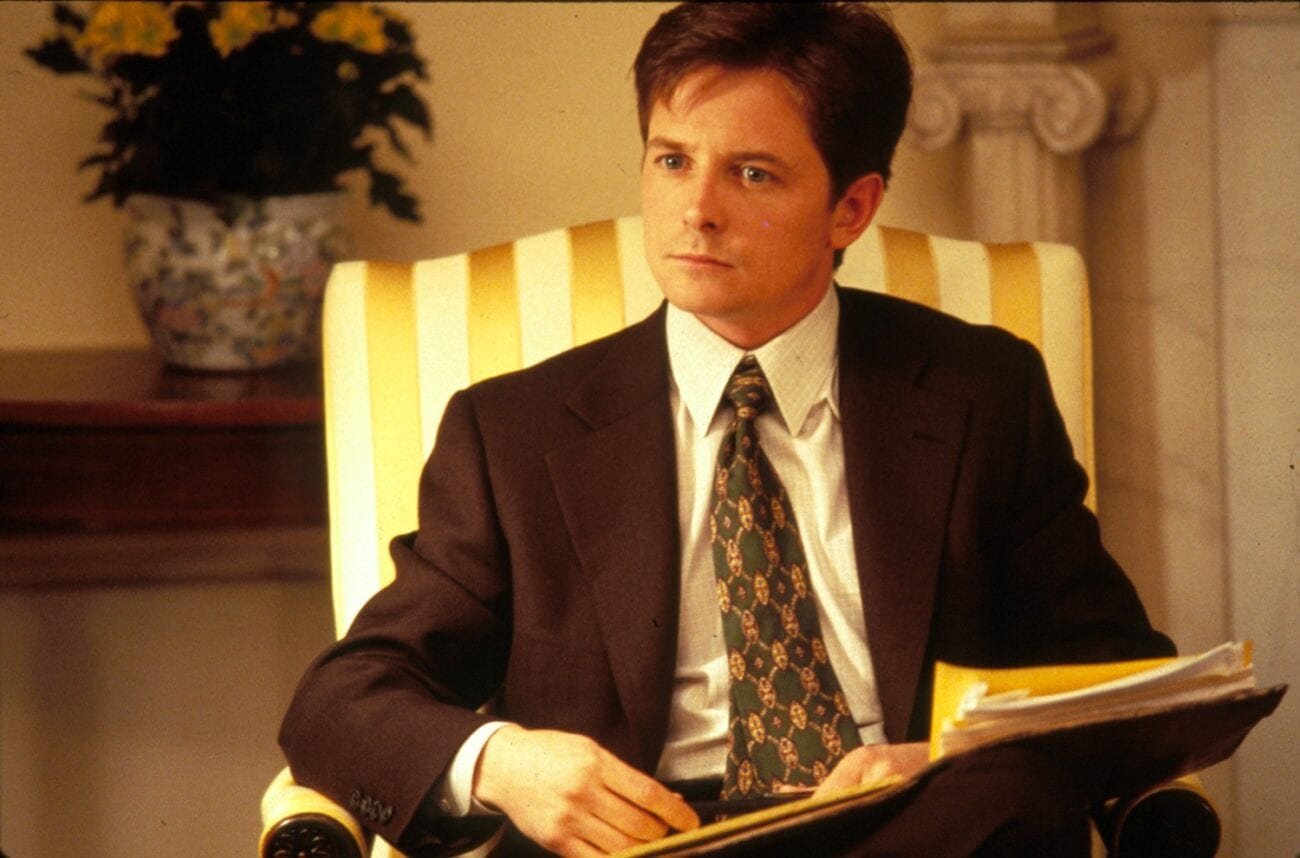 Lewis Rothchild listens and takes notes sitting in the Oval Office.