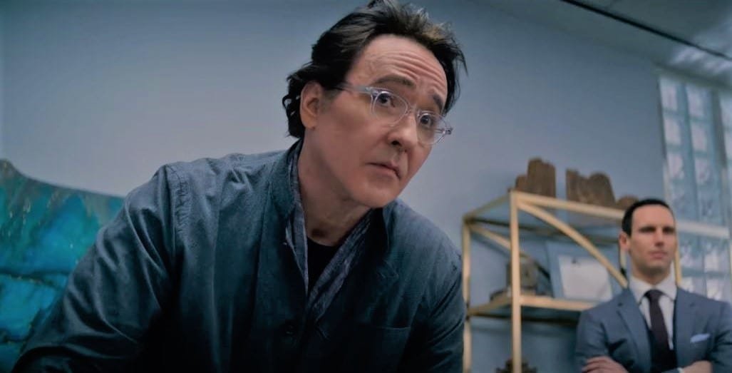John Cusack as the head of Christie Bios