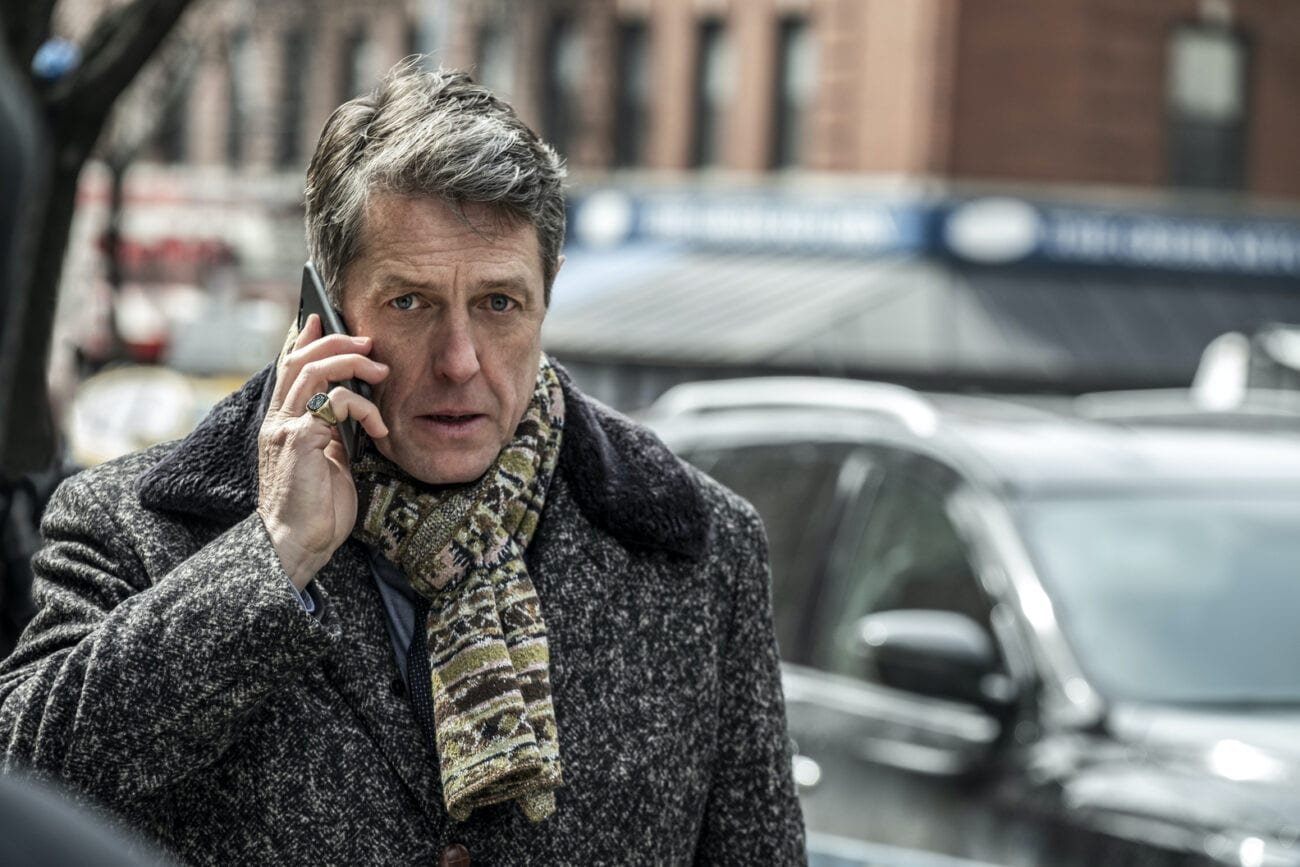 Jonathan holds a phone to his ear