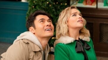 Henry Golding and Emilia Clarke look skyward in Last Christmas