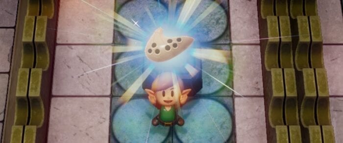 Link holds an Ocarina above his head.