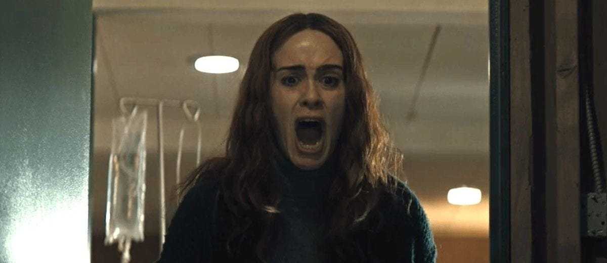 Diane screams into a room.