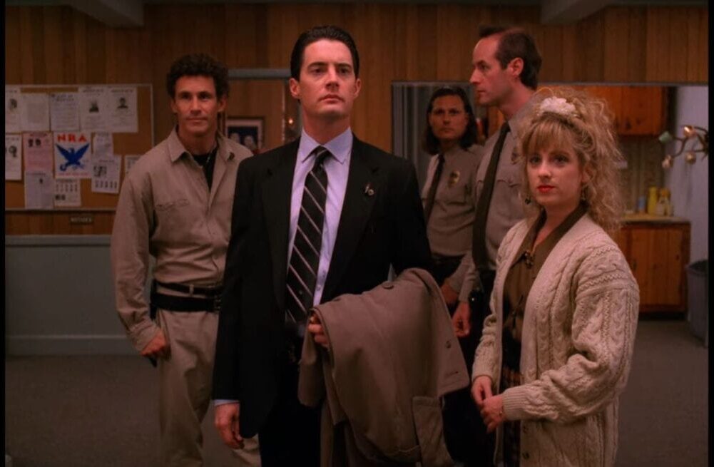 Truman, Cooper, Hawk, Andy, and Lucy stand in the lobby of the Twin Peaks Police Department