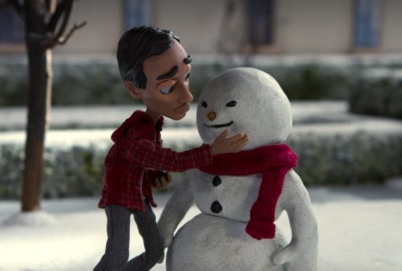 A claymation version of Abed is making a snowman that looks like Chang