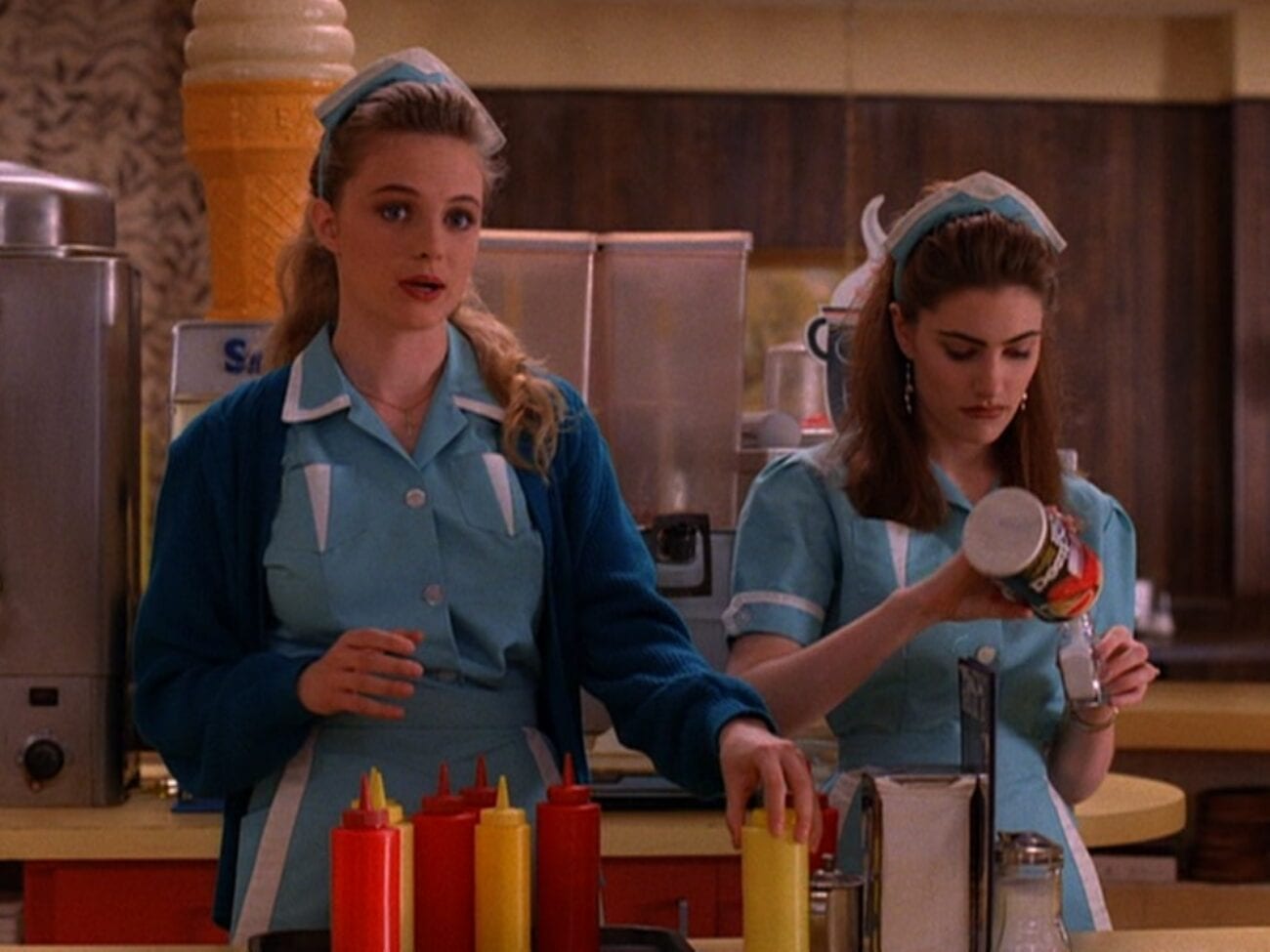 Annie and Shelly in uniform behind the counter at the Double-R Diner