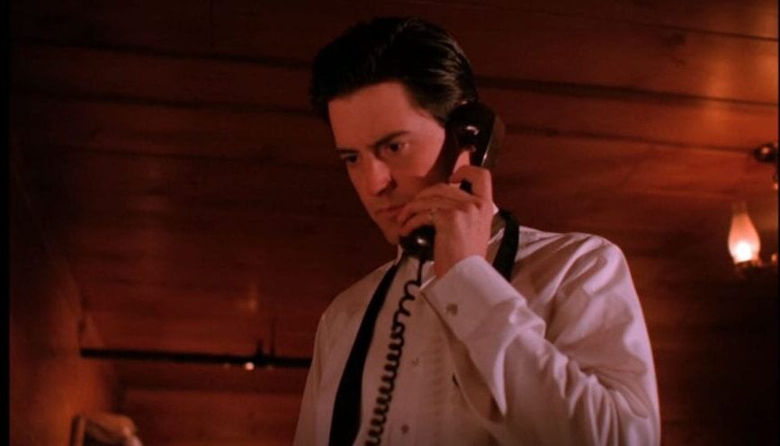 Dale Cooper answers the phone in his room at the Great Northern