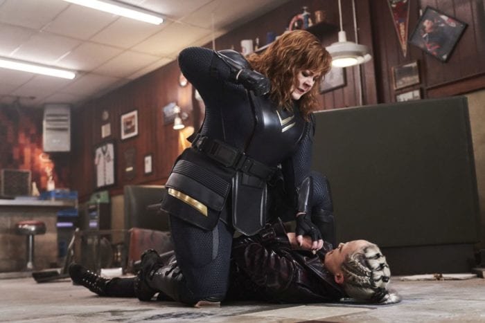Lydia holds down Laser and threatens to punch her.