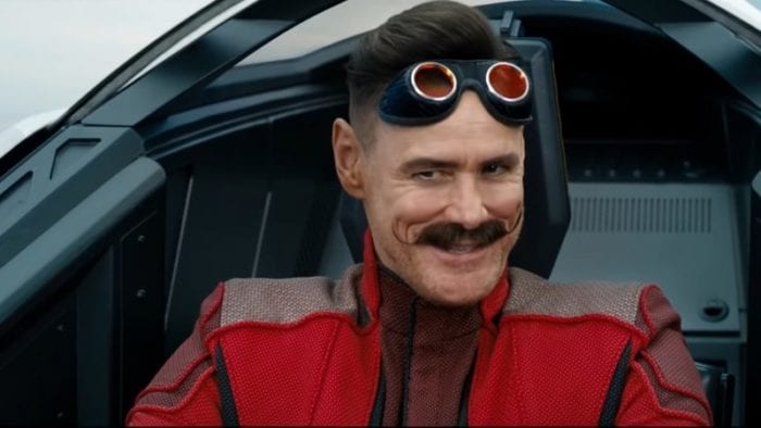 Jim Carrey as Dr. Robotnik, wearing goggles and flying at high speed in Sonic the Hedgehog