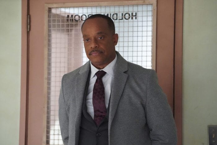 NCIS Director Leon Vance (rocky carroll) entering interrogation room
