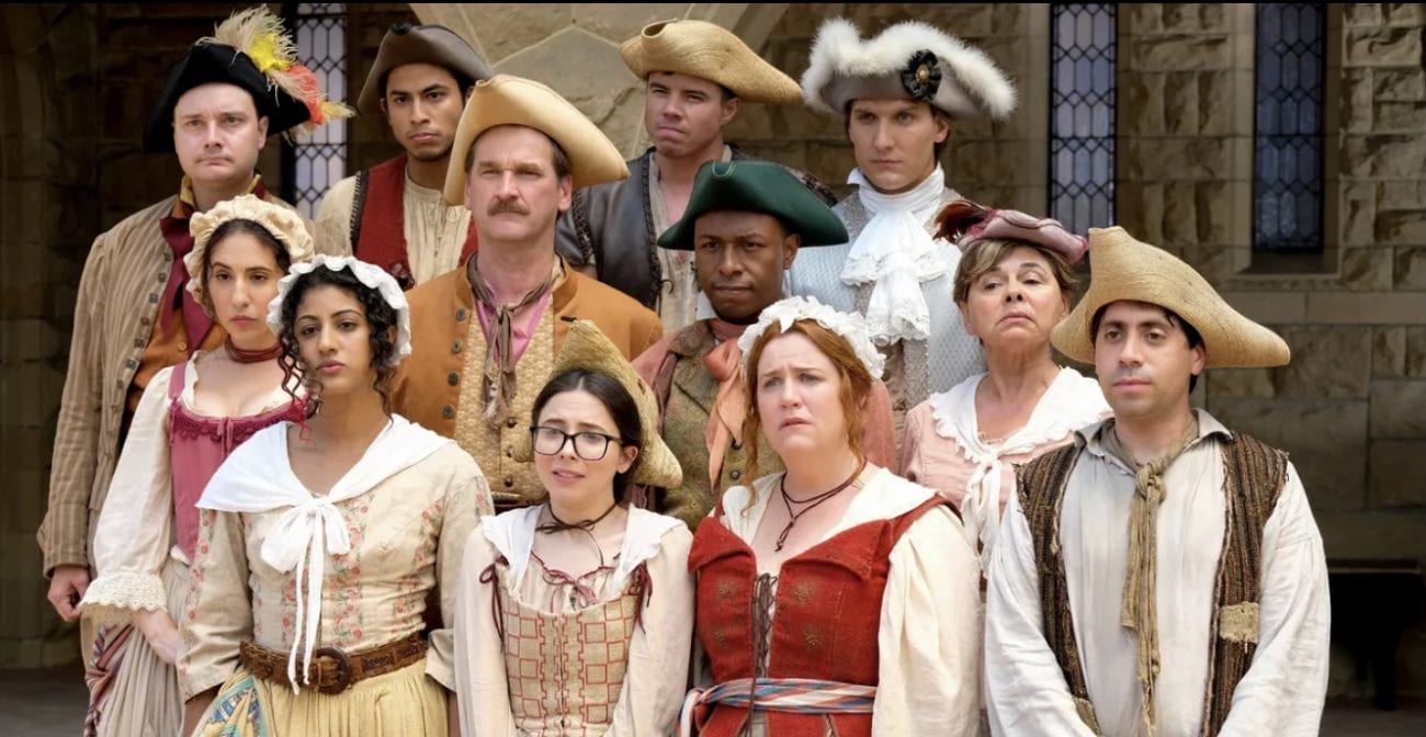 The cast of Crazy Ex-Girlfriend stands in sailr costumes